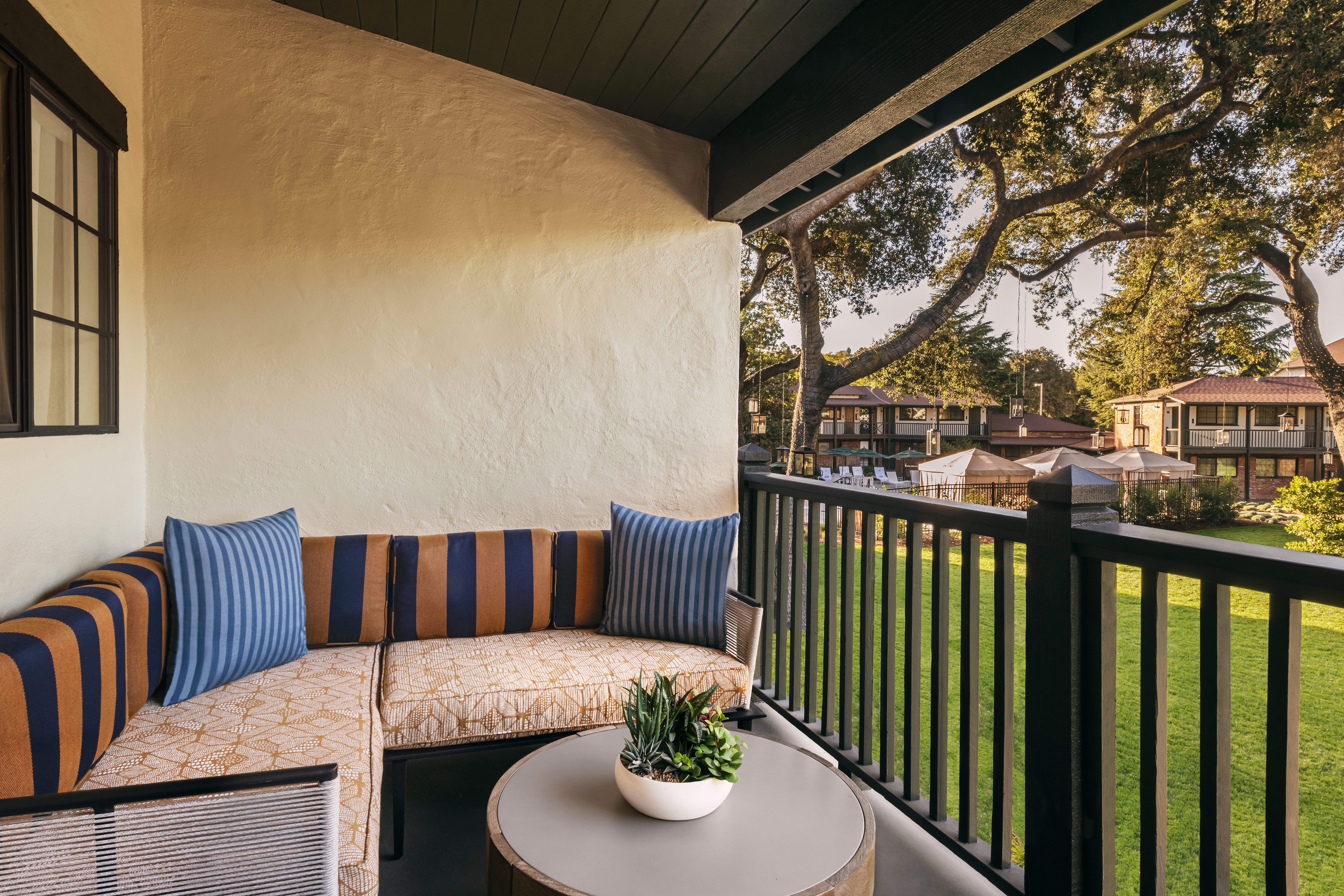 Private guest room balcony overlooking the gardens at Paso Robles Inn.